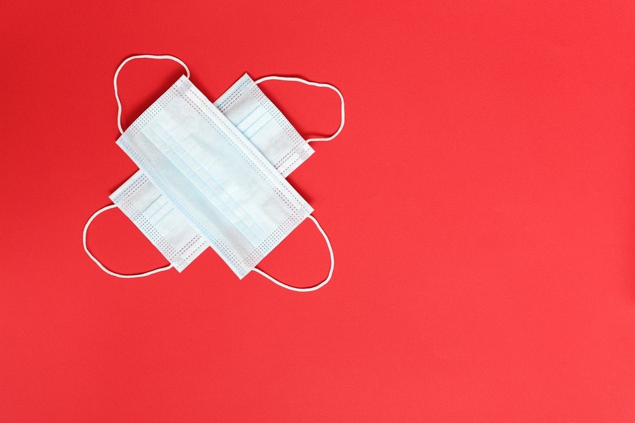 face masks on red background