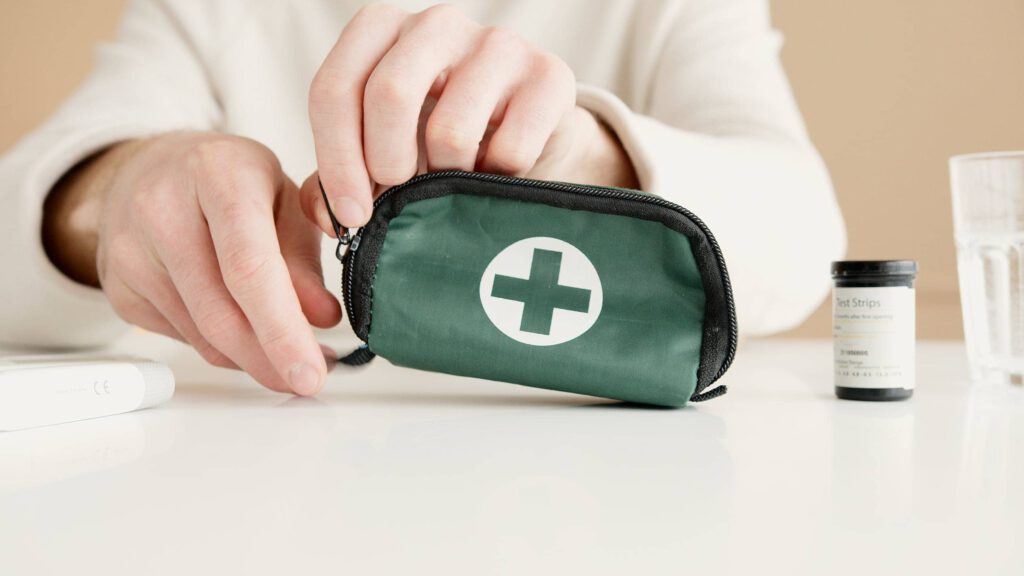 nurse with first aid kit