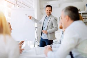 man with whiteboard education training