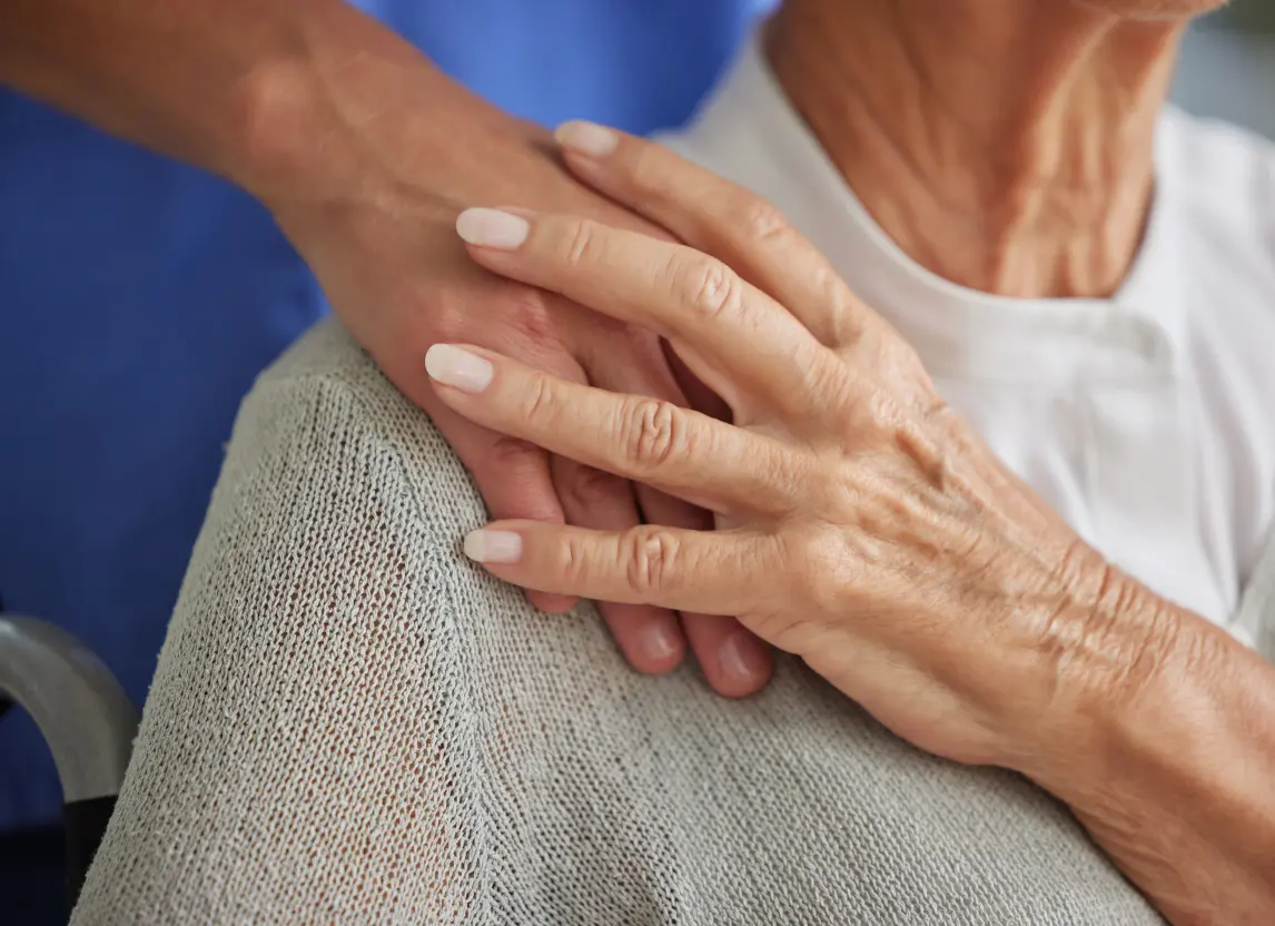 Comforting elderly lady